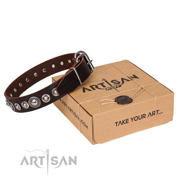 Genuine leather dog collar made of reliable material with corrosion resistant fittings